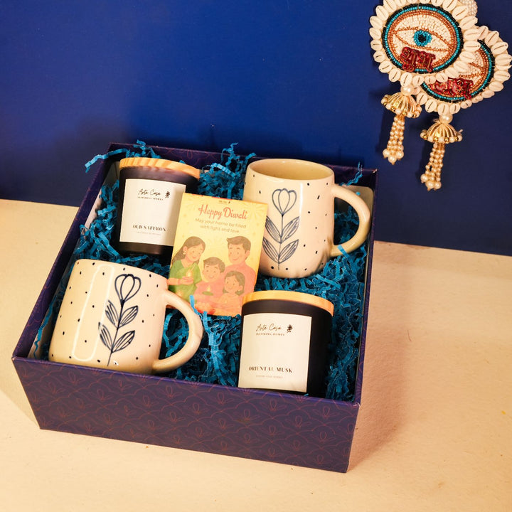Sips & Sparks Diwali Gift Hamper | Includes 2 Coffee Mugs, 2 Hangings, 2 Candles, 1 Diwali Card, 1 Gift Box