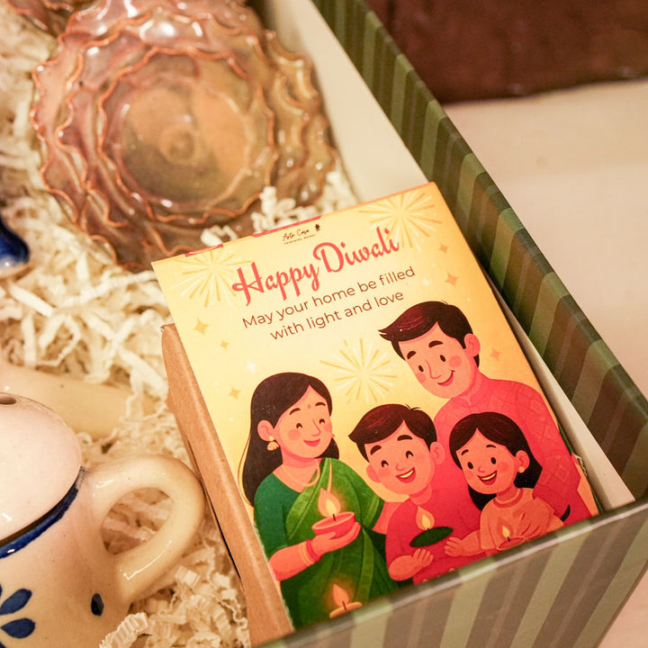 Moments & Moods Diwali Gift Hamper | Includes 1 Aroma Diffuser, 2 Hangings, 1 Chocolate, 2 Tealight Holders, 1 Diwali Card, 1 Gift Box