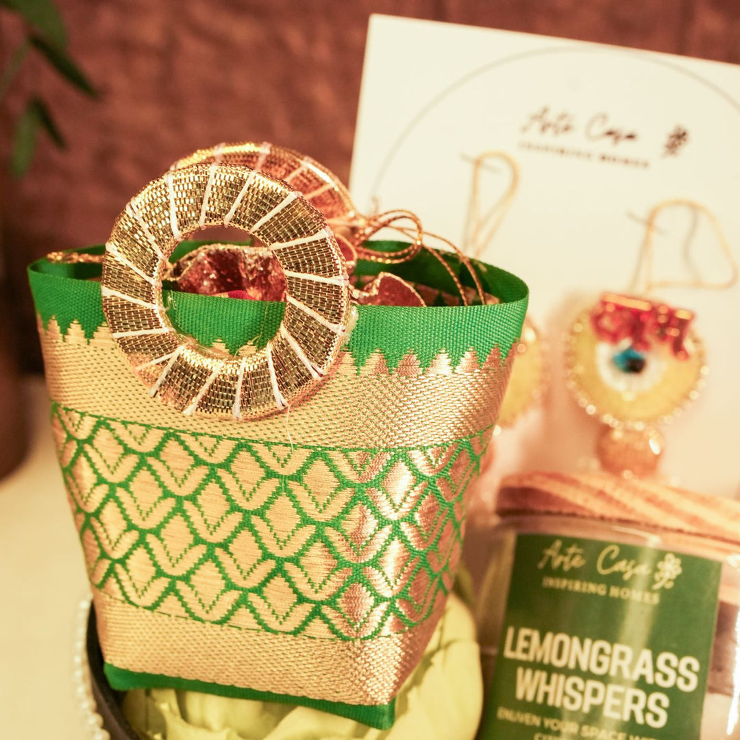 Aura Diwali Gift Hamper | Includes 2 Hangings, 1 Candle, 1 Dry Fruit Potli, 1 Decor Flower, 1 Diwali Card, 1 Round Gift Box