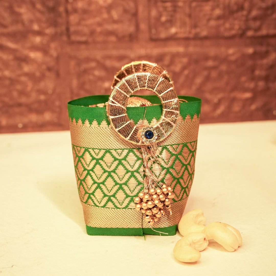 Aura Diwali Gift Hamper | Includes 2 Hangings, 1 Candle, 1 Dry Fruit Potli, 1 Decor Flower, 1 Diwali Card, 1 Round Gift Box