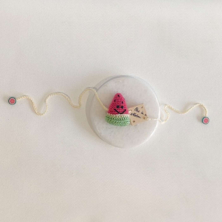 Handmade Crochet One in a Melon Kids Rakhi With Roli Chawal