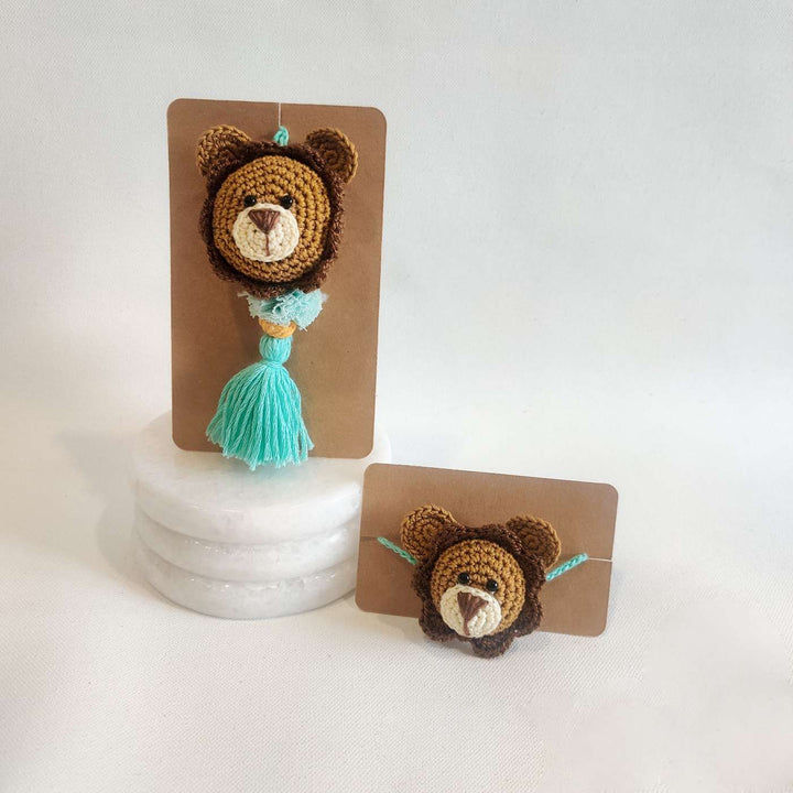 Handmade Crochet Lion Cub Kids Rakhi With Roli Chawal - Full Product Set on Marble Pods