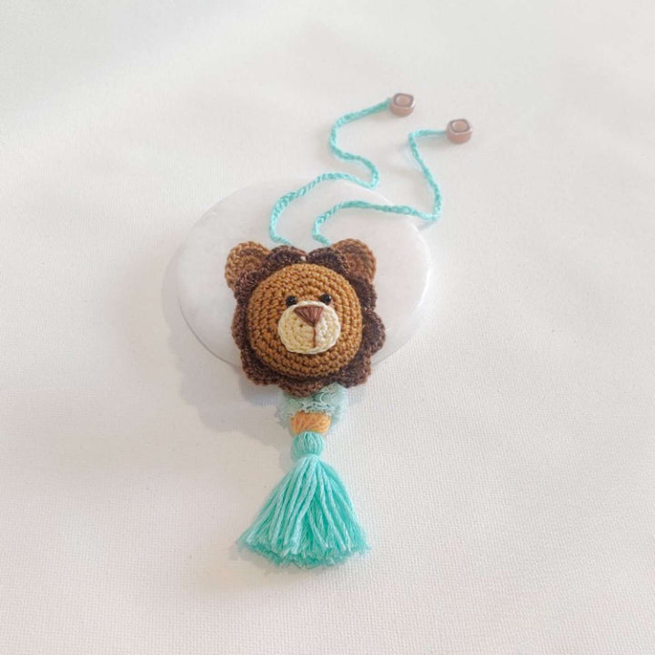Handmade Crochet Lion Cub Kids Rakhi With Roli Chawal - Packaged Product on Card