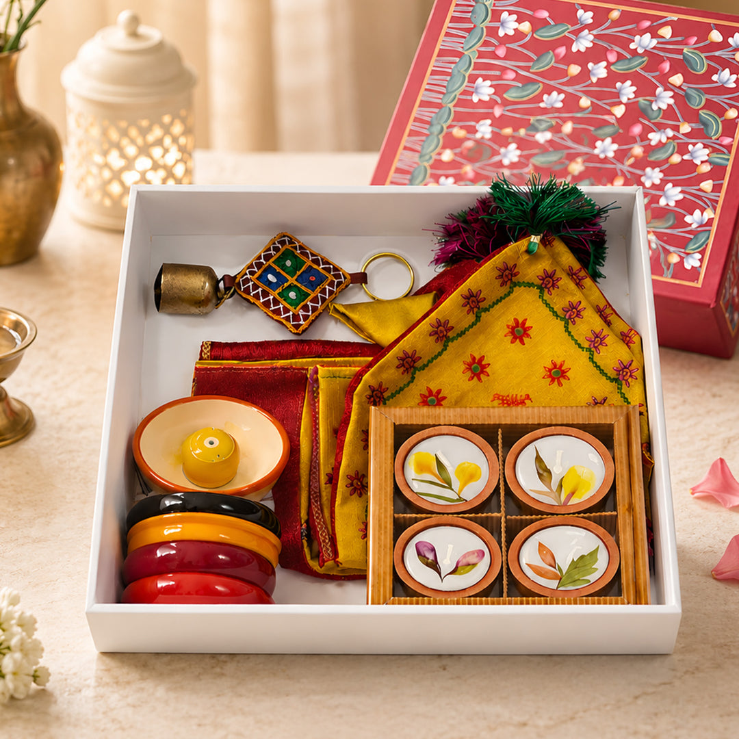 "Pichwai" Handmade Gift Hamper With Kasuti Toran, Etikoppaka Holders & Terracotta Candles For Festive Gifting