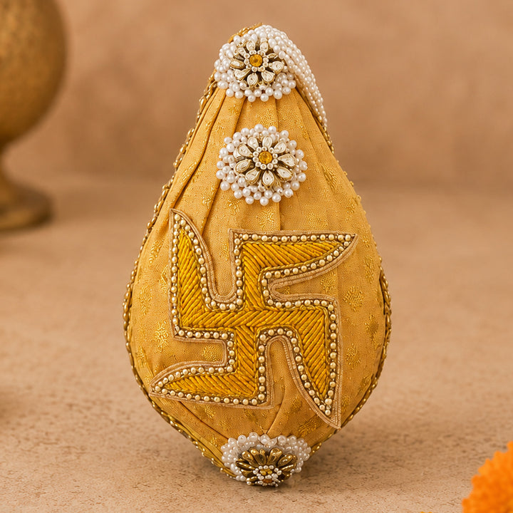 Brocade Swastik Decorated Nariyal Shrifal/Coconut With Kundan Detailing For Festive Gifting