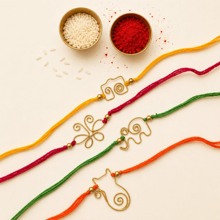 Handcrafted Wired Brass Charm Rakhi With Roli Chawal For Brother | Set of 4