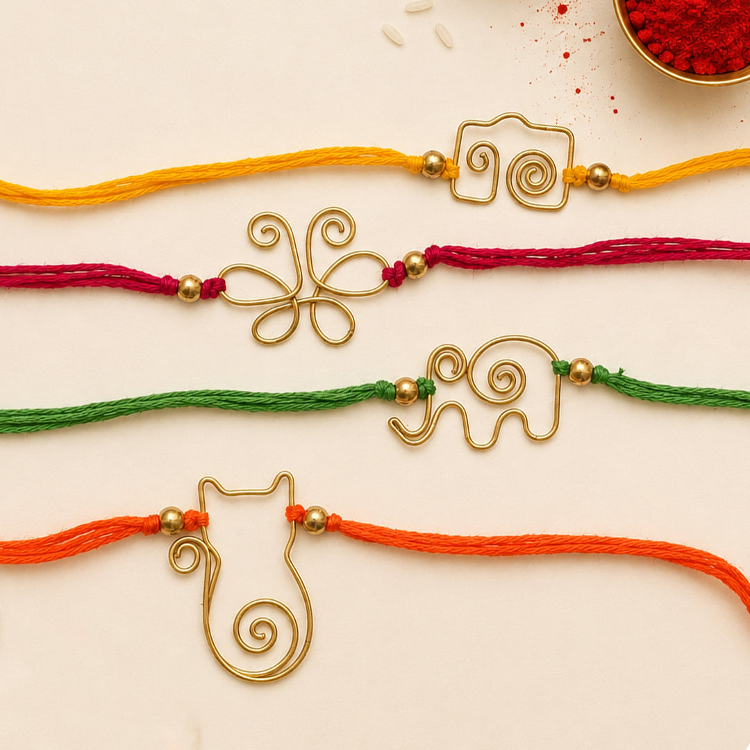 Handcrafted Wired Brass Charm Rakhi With Roli Chawal For Brother | Set of 4