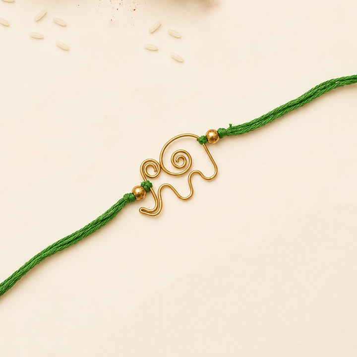 Handcrafted Wired Brass Charm Rakhi With Roli Chawal For Brother