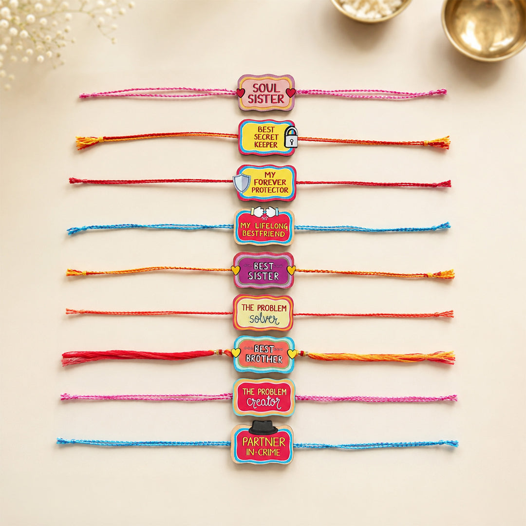 Glossy Printed Wooden Assorted Rakhi Combo With Kumkum Rice | Set of 9
