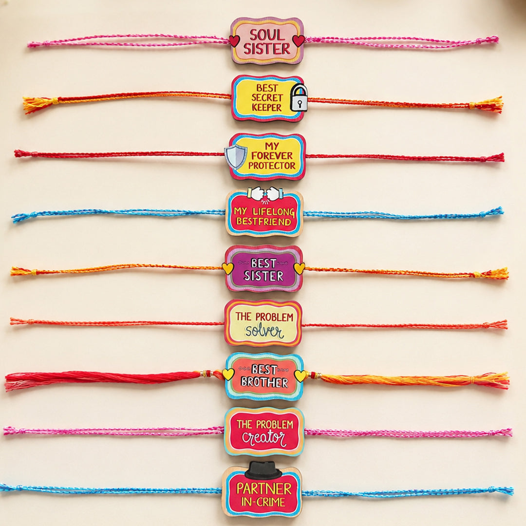 Glossy Printed Wooden Assorted Rakhi Combo With Kumkum Rice | Set of 9