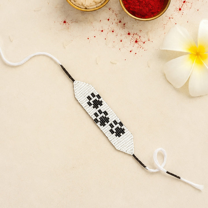 Hand Beaded Paw Motif White Bracelet Rakhi With Roli Chawal For Pets