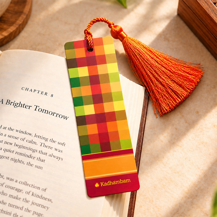 Saffron Checked Kanchipuram Weaves Pattu-Inspired Metal Bookmark For Festive Gifting