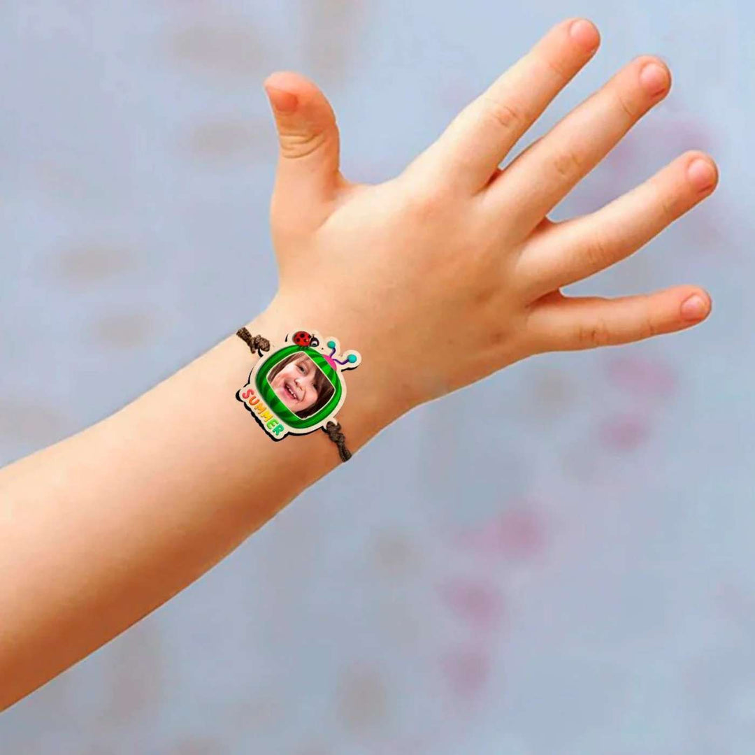 Photo Personalized Handmade Cocomelon Wooden Kids Rakhi With Roli Chawal - Child Wearing Bracelet Close-up