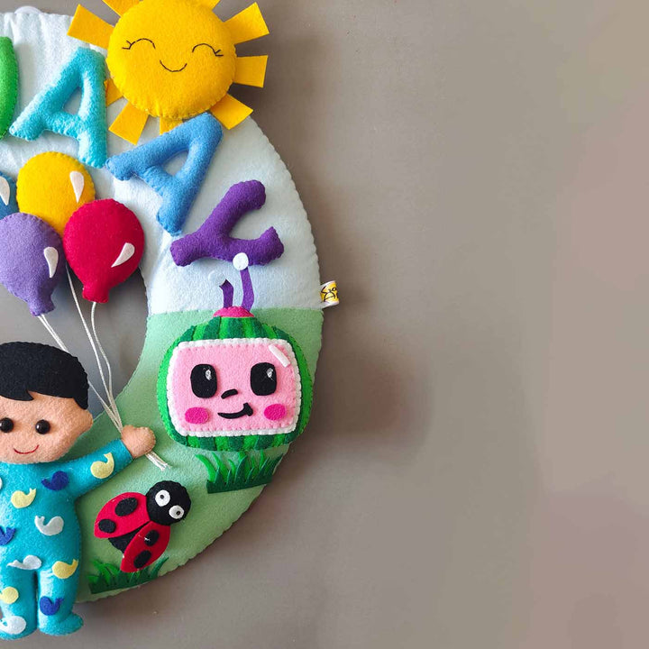 Hand-stitched Cocomelon Themed Round Felt Kids Name Plate for Baby Boy