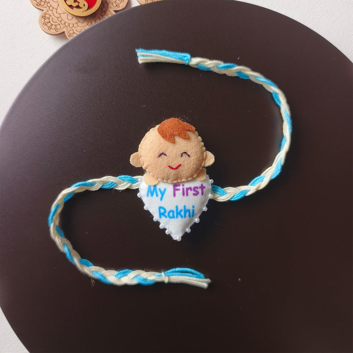 Handmade Felt Blue "My First Rakhi" With Roli Chawal For Baby