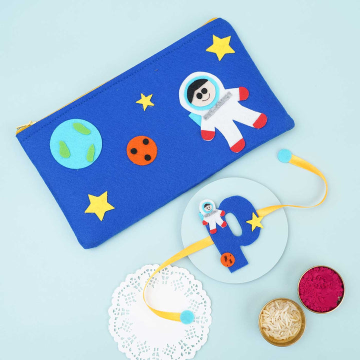 Personalised Handmade Felt Rakhi Astronaut Pouch With Chocolates Roli Chawal - Front View with Rakhi and Decorative Plates