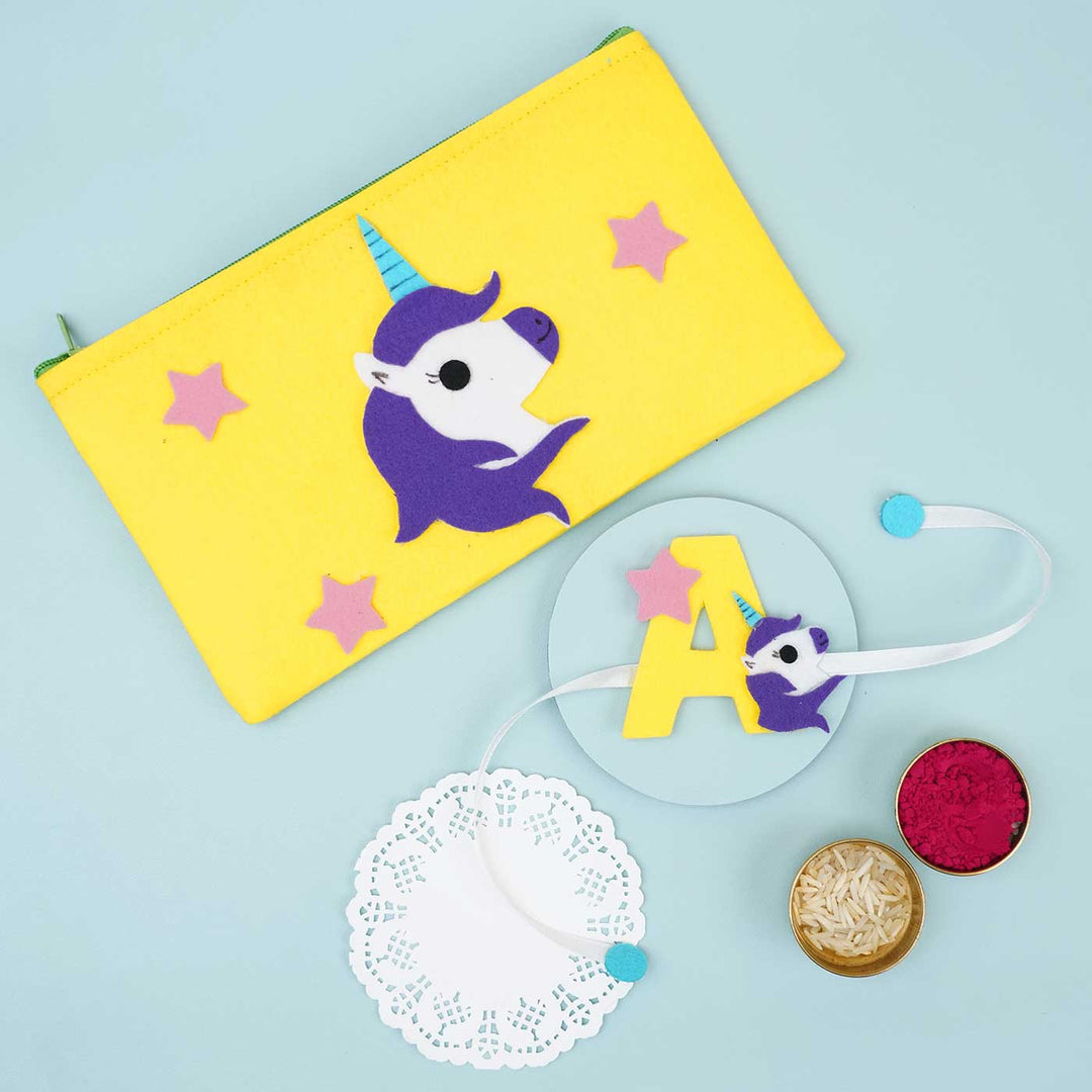Personalised Handmade Felt Rakhi Unicorn Pouch With Chocolates Roli Chawal - Styled Flat Lay with Decorative Items