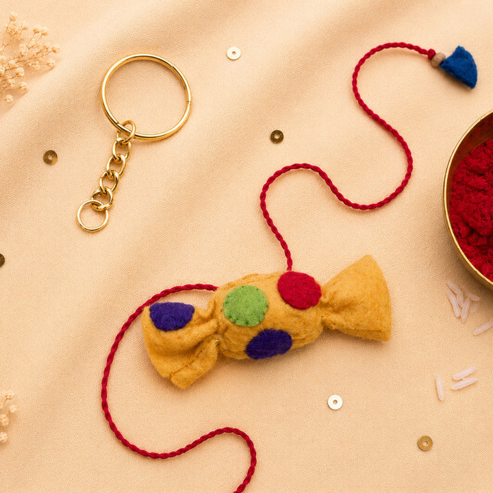 Hand Embroidered Toffee Rakhi With Keychain For Brother