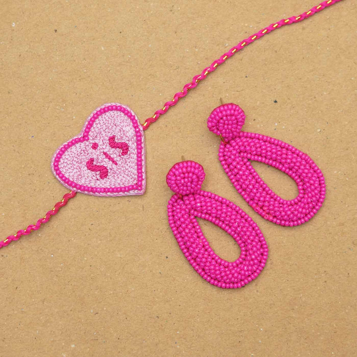 Handmade Beaded Chupa Chups Rakhi Hamper For Sisters Set Of 3 - Close-up of Rakhi and Earrings