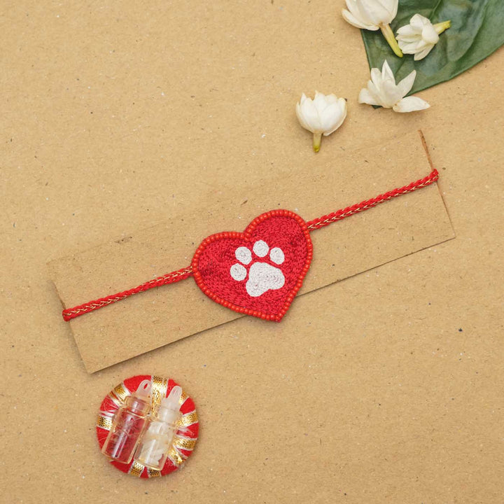 Handmade Beaded Paw Heart Rakhi With Roli Chawal