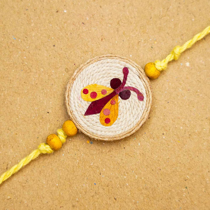 Handmade Eco-friendly Kanjoos Makhichoos Pressed Flower Rakhi with Roli Chawal