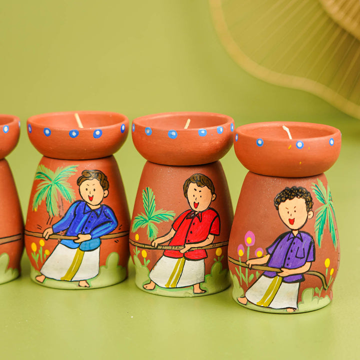 Onam Edition | Hand-painted Clay Tug of War Theme Tealight Holders | Set of 7