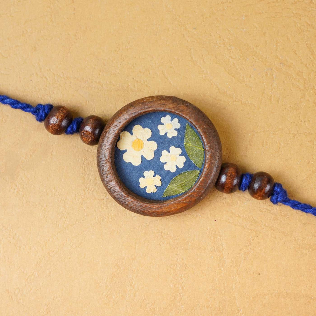 Handmade Eco-friendly Jasmine Pressed Flower Rakhi with Roli Chawal
