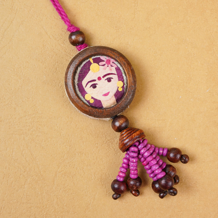 Handmade Eco Friendly Shakti Pressed Flower Lumba Rakhi For Bhabhi With Roli Chawal - Close-up of Rakhi Thread Charm