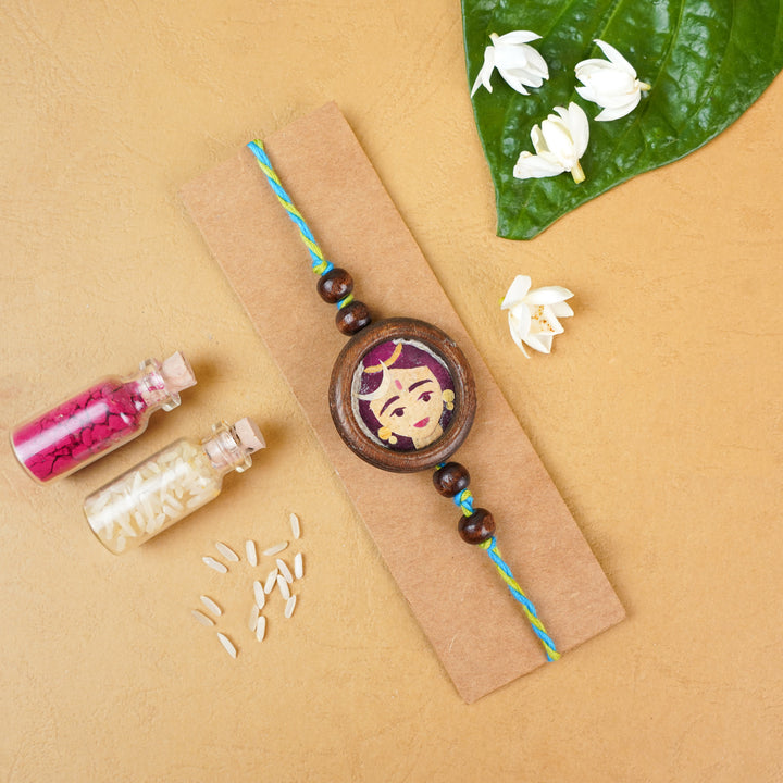 Handmade Eco-friendly Shiv Pressed Flower Rakhi with Roli Chawal