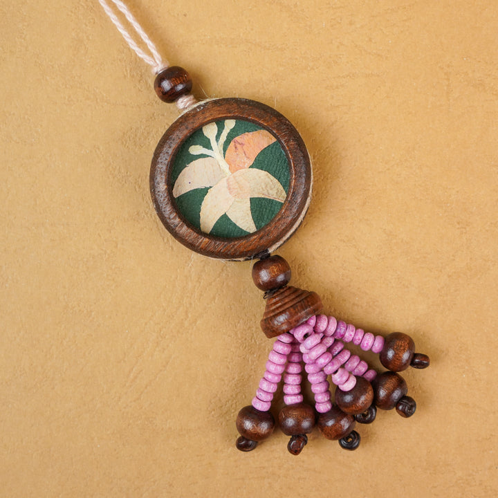 Handmade Eco Friendly Lily Pressed Flower Lumba Rakhi For Bhabhi With Roli Chawal - Close-up of single rakhi decoration