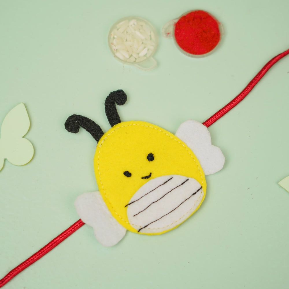 Handmade Squish Mallows Bumblebee Theme Felt Kids Rakhi - Flat Lay with Beads