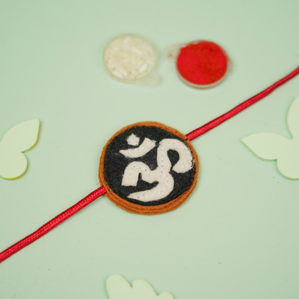 Handmade Om Theme Relegious Felt Kids Rakhi - Full Product Laid Flat