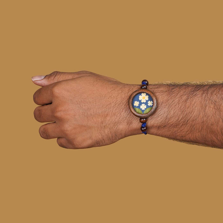 Handmade Eco-friendly Jasmine Pressed Flower Rakhi with Roli Chawal