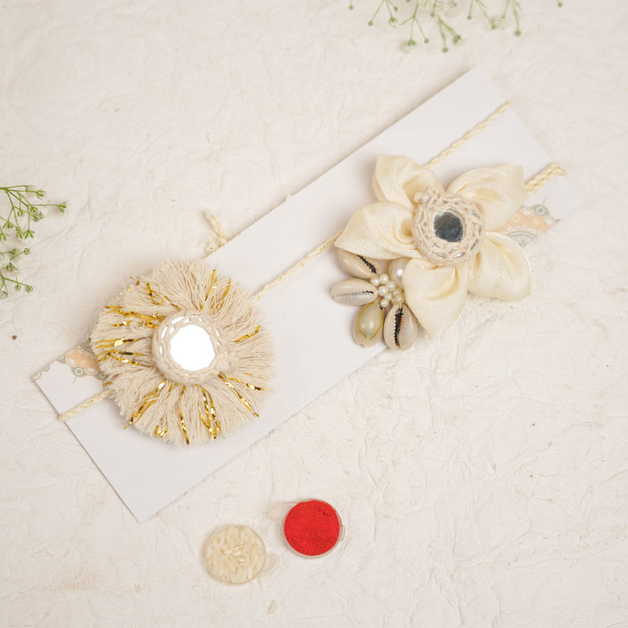 Handmade White Shwet Shell And Mirror Bhaiya Bhabhi Rakhi With Roli Chawal - Top View of Two Necklaces