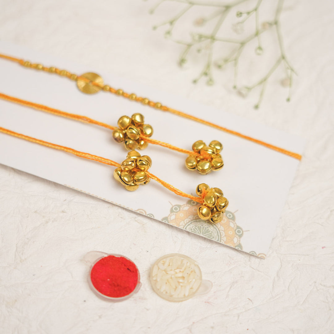 Handmade Swarn Sutra Ghungroo Bhaiya Bhabhi Rakhi With Roli Chawal - Close-up of Bell Detail (6)