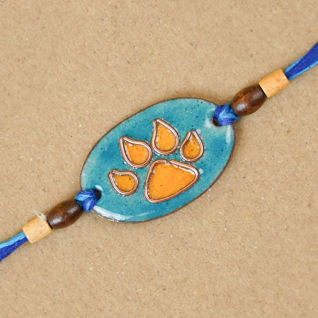 Handmade Pawfect Copper Enamel Rakhi With Chocolates & Roli Chawal