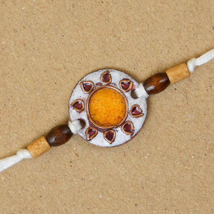 Handmade Sooraj White Copper Enamel Rakhi With Chocolates & Roli Chawal