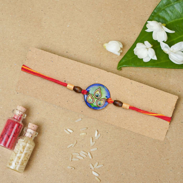Handmade Morpankh Copper Enamel Rakhi With Chocolates & Roli Chawal