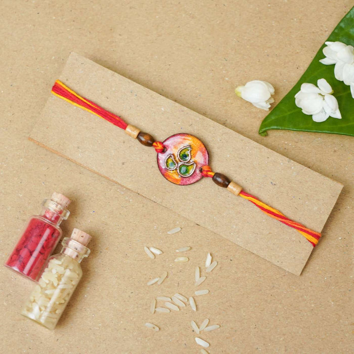 Handmade Morpankh Copper Enamel Rakhi With Chocolates & Roli Chawal