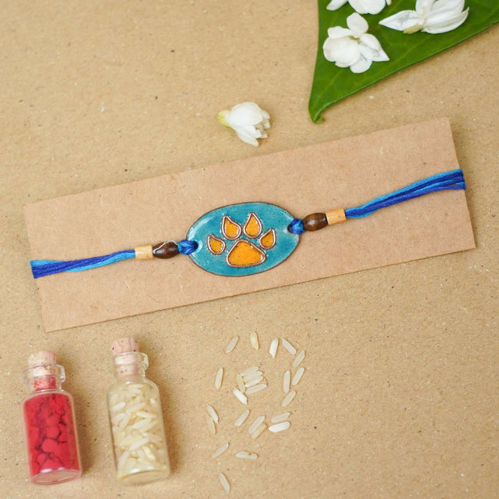 Handmade Pawfect Copper Enamel Rakhi With Chocolates & Roli Chawal