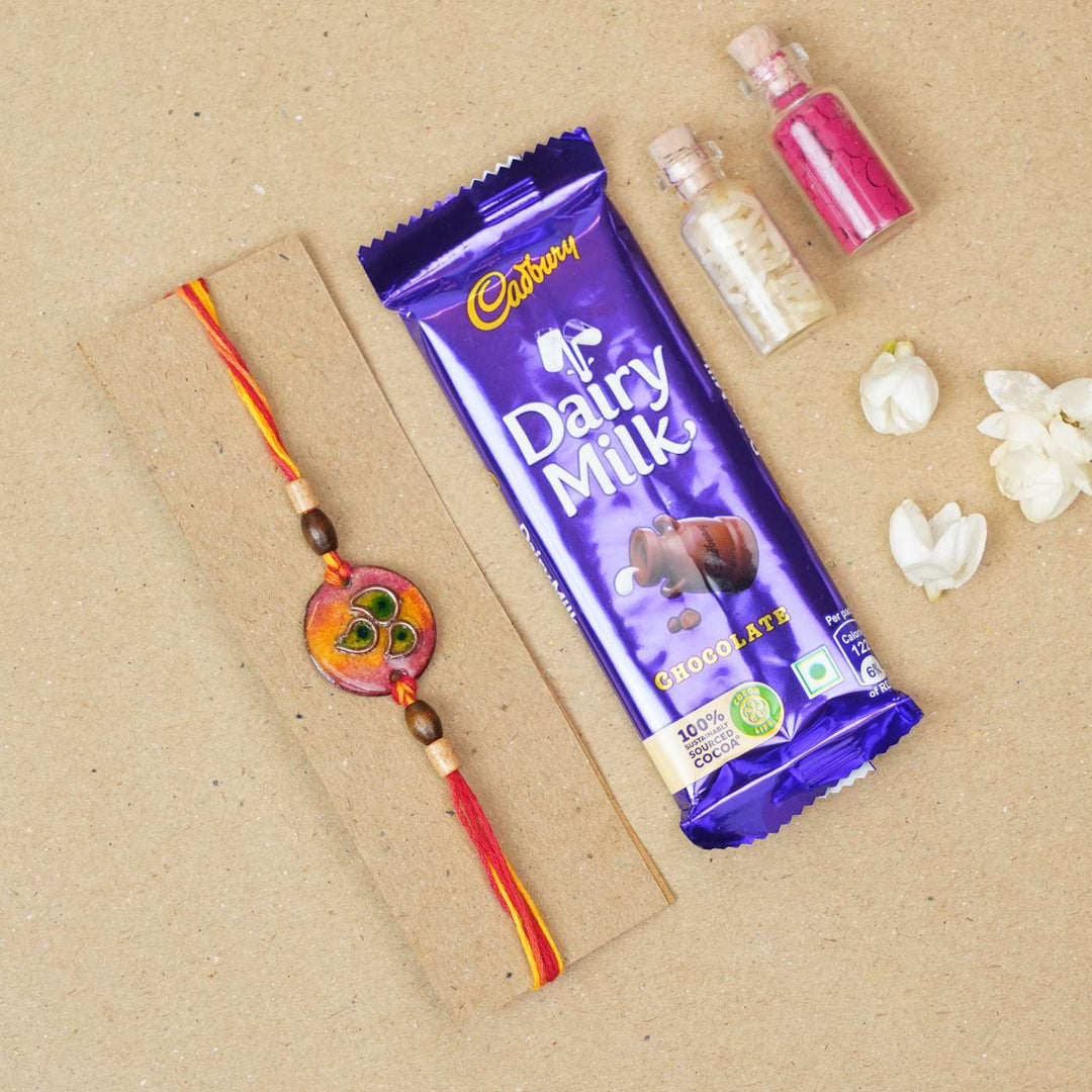 Handmade Morpankh Copper Enamel Rakhi With Chocolates & Roli Chawal