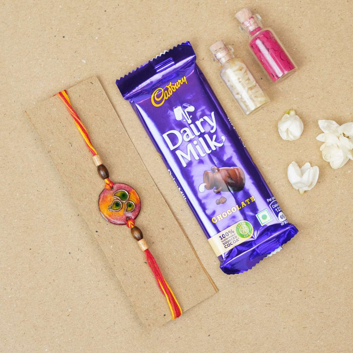 Handmade Morpankh Copper Enamel Rakhi With Chocolates & Roli Chawal