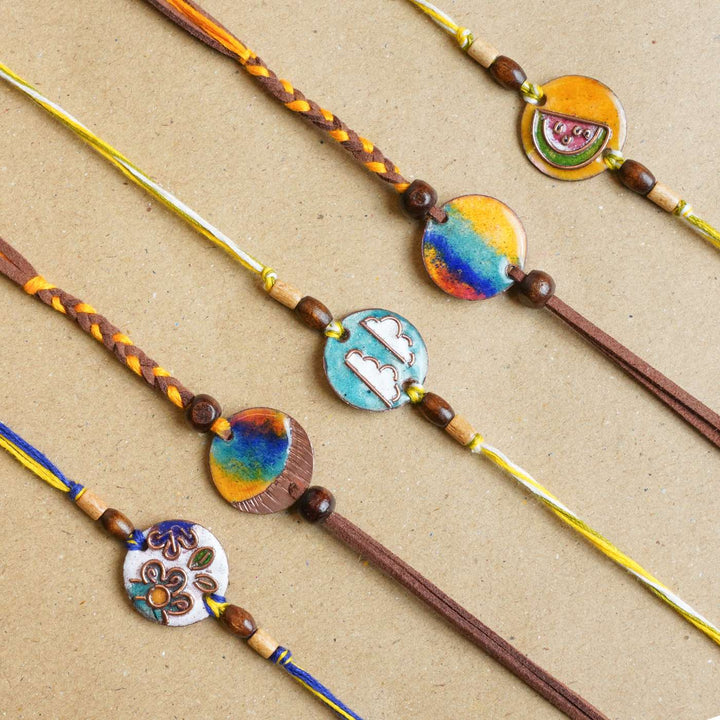 Handmade Pawfect Copper Enamel Rakhi With Chocolates & Roli Chawal