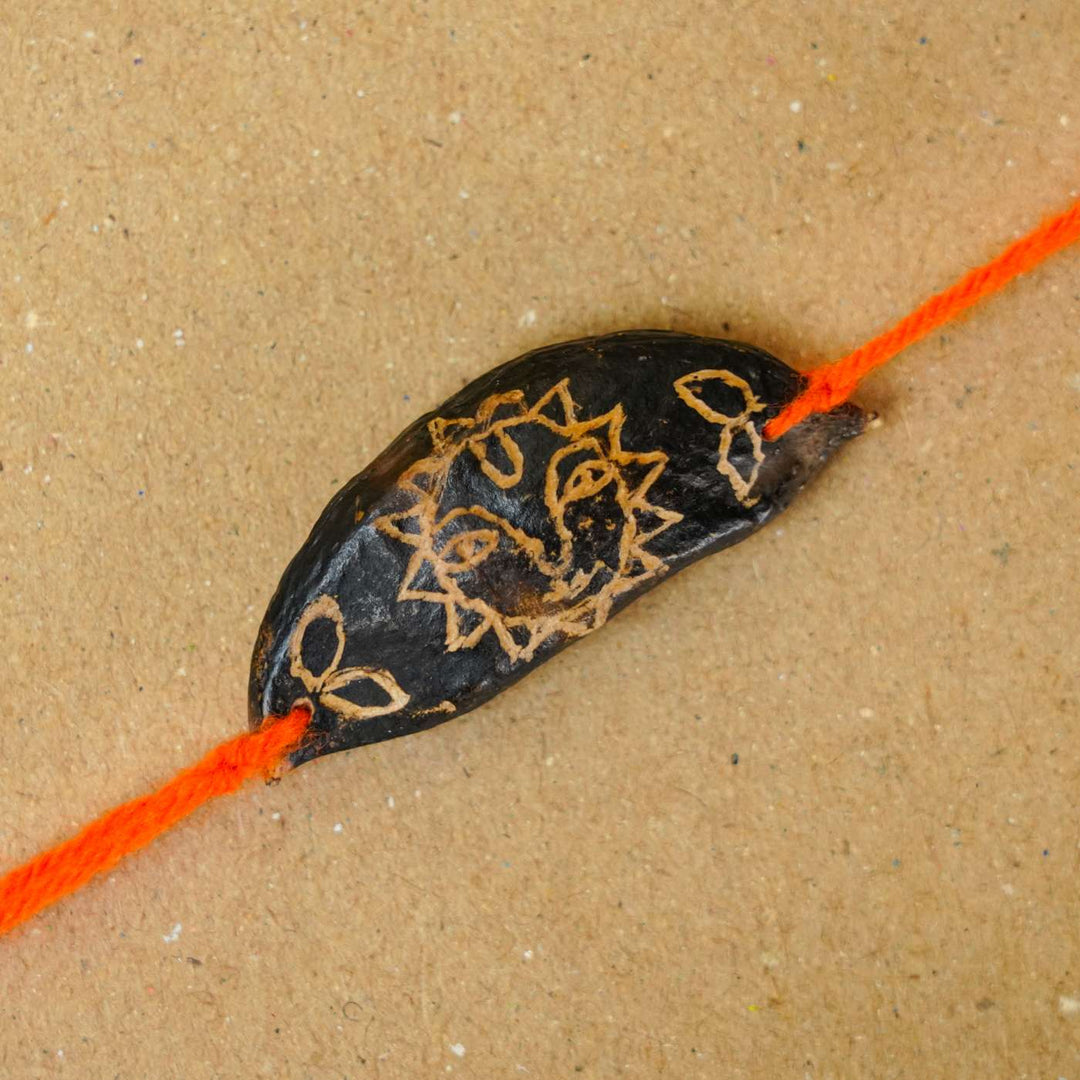 Handmade Plantable Orange Sun Seed Rakhi With Roli Chawal