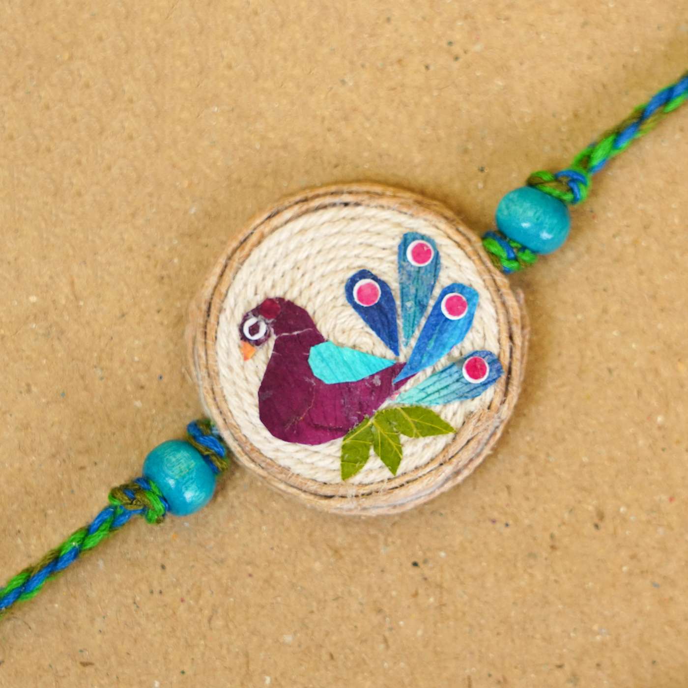 Buy Handmade Pressed Flower Art Peacock Jute Rakhi With Roli Chawal ...