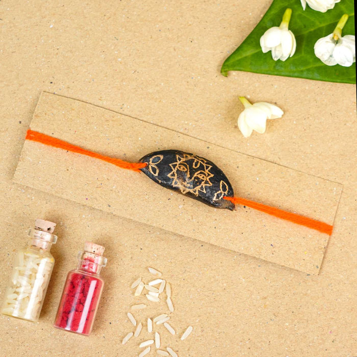 Handmade Plantable Orange Sun Seed Rakhi With Roli Chawal