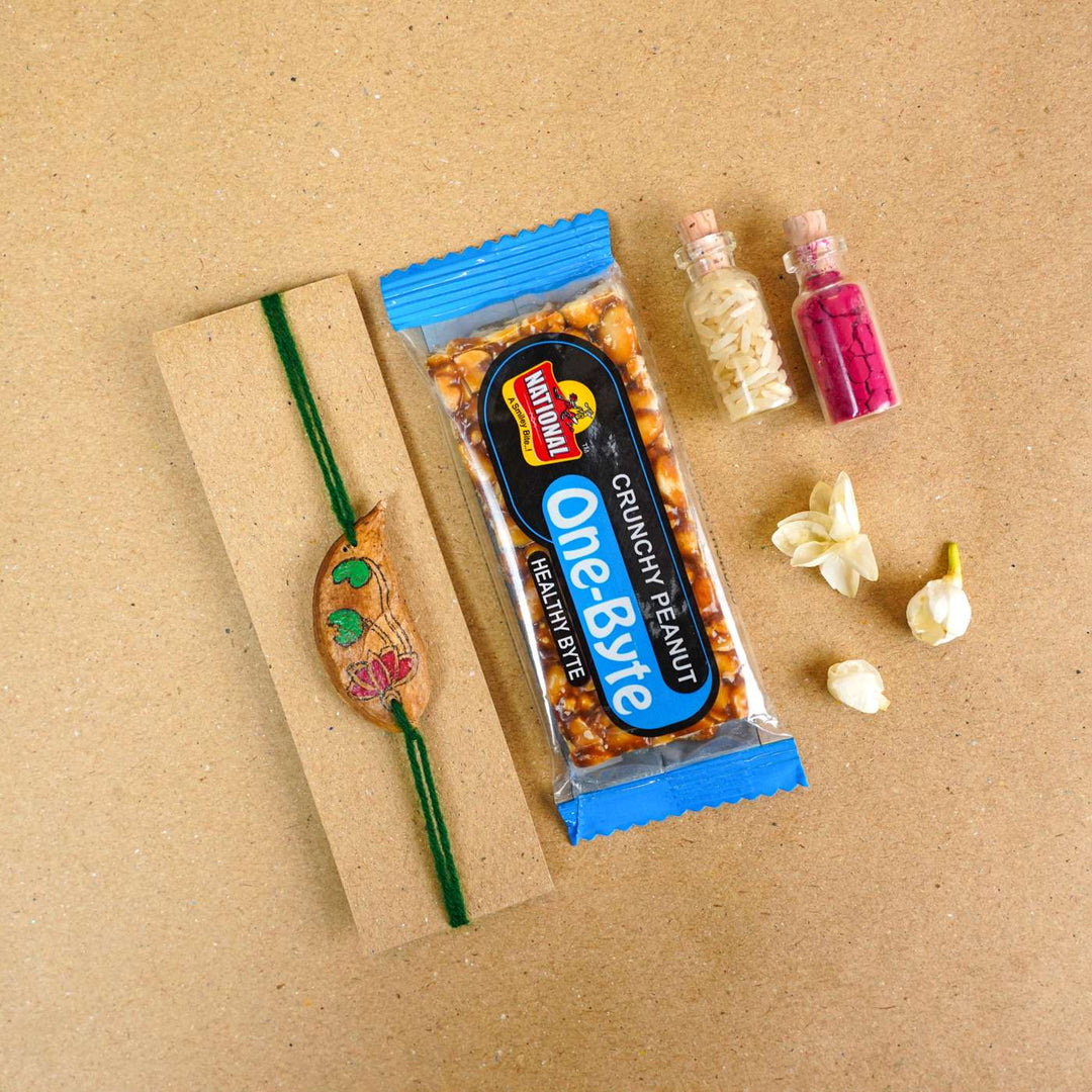 Handmade Plantable Magenta Lotus  Seed Rakhi With Roli Chawal