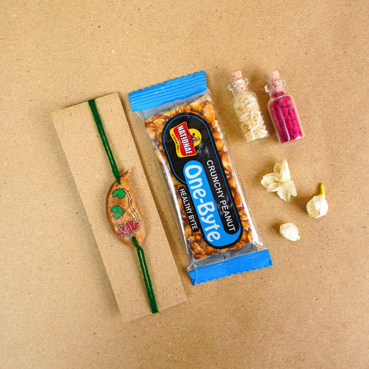 Handmade Plantable Magenta Lotus  Seed Rakhi With Roli Chawal