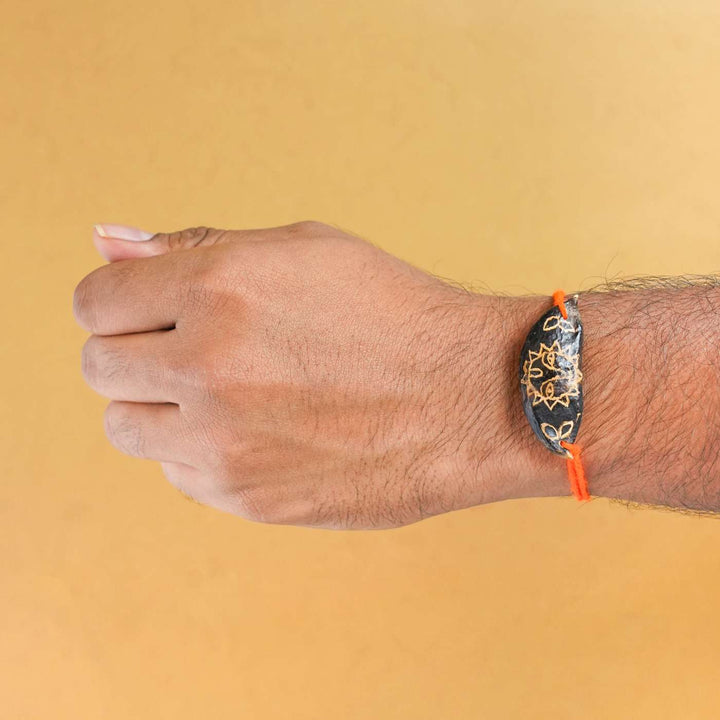 Handmade Plantable Orange Sun Seed Rakhi With Roli Chawal