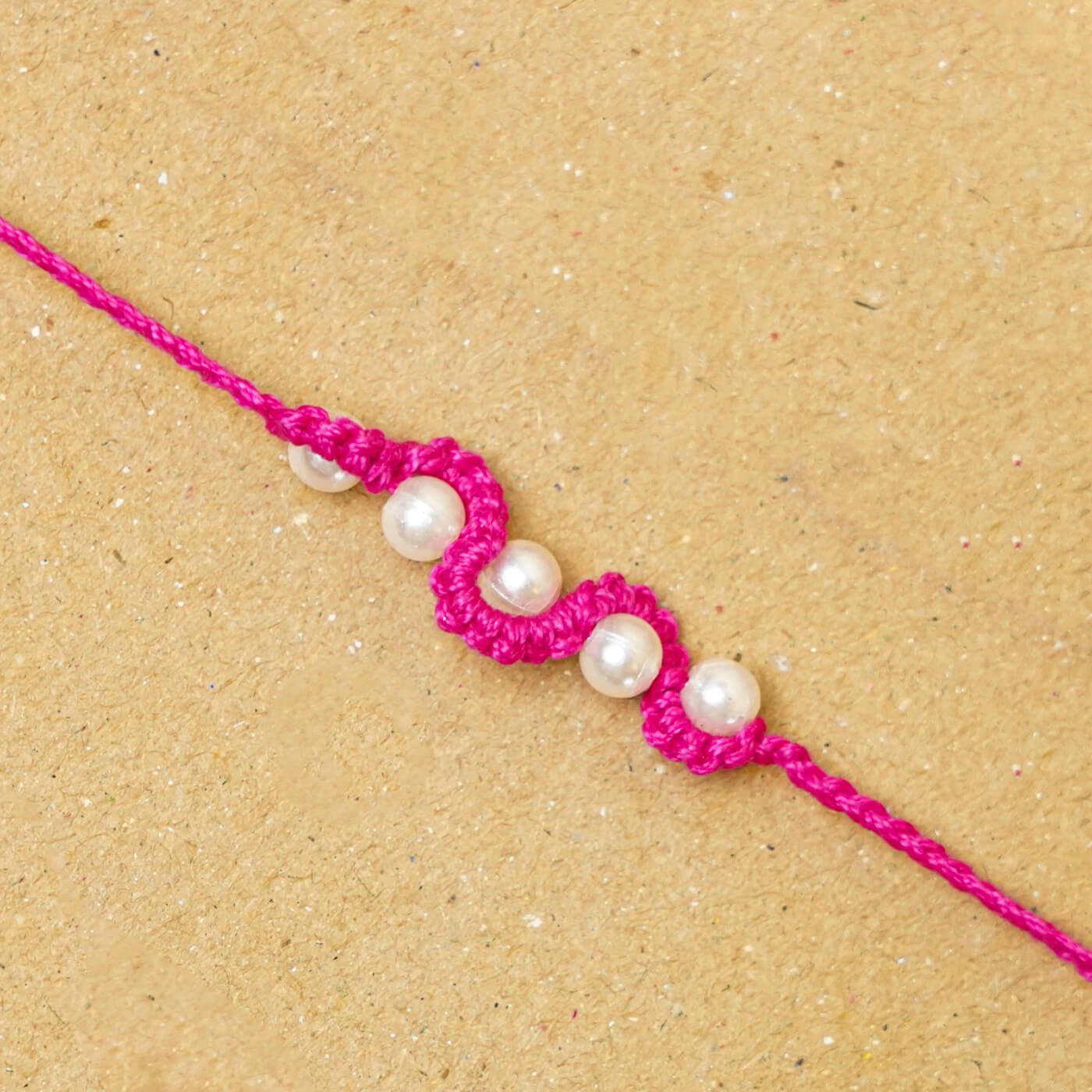 Buy Handmade Macrame Five Pearl Rakhi With Roli Chawal Online On Zwende